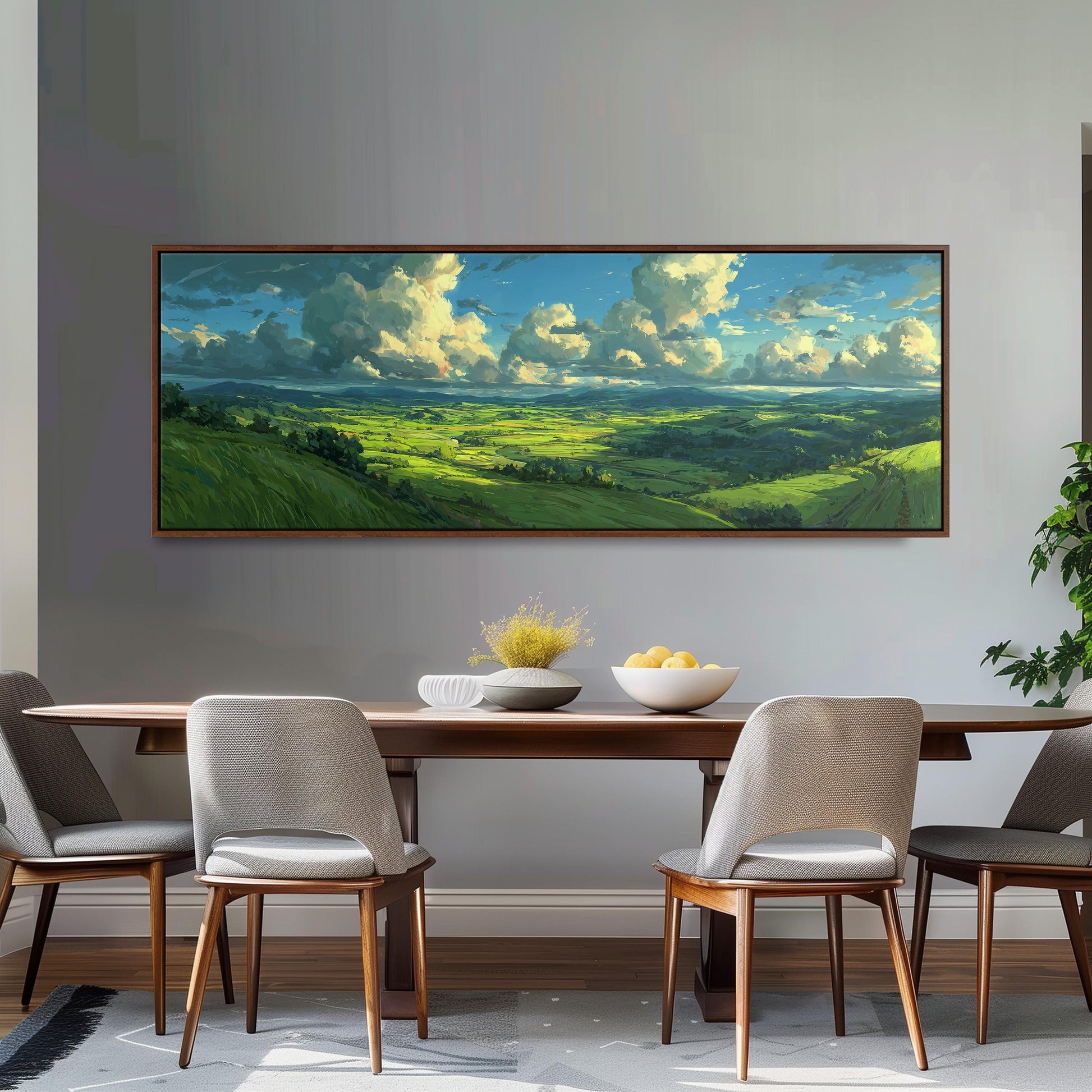 a large painting of a countryside landscape hanging on a wall above a wooden dining table with four chairs.