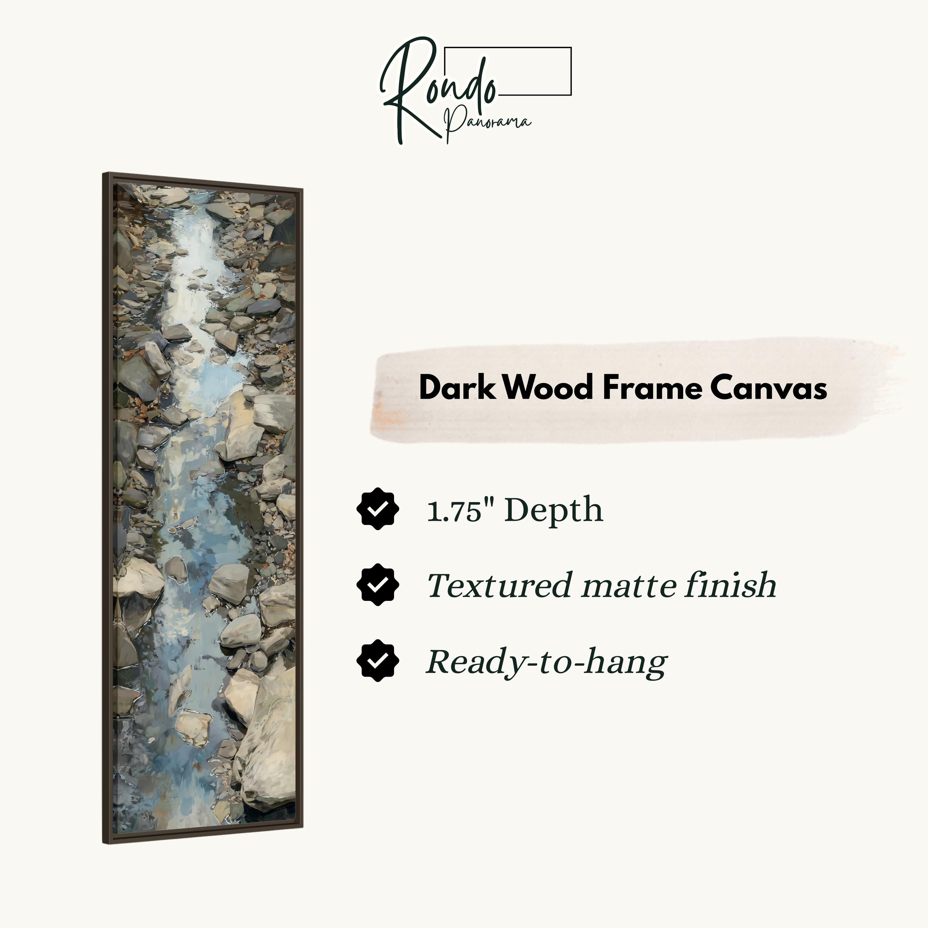 The image is a dark wood frame canvas depicting a river flowing through a rocky landscape.