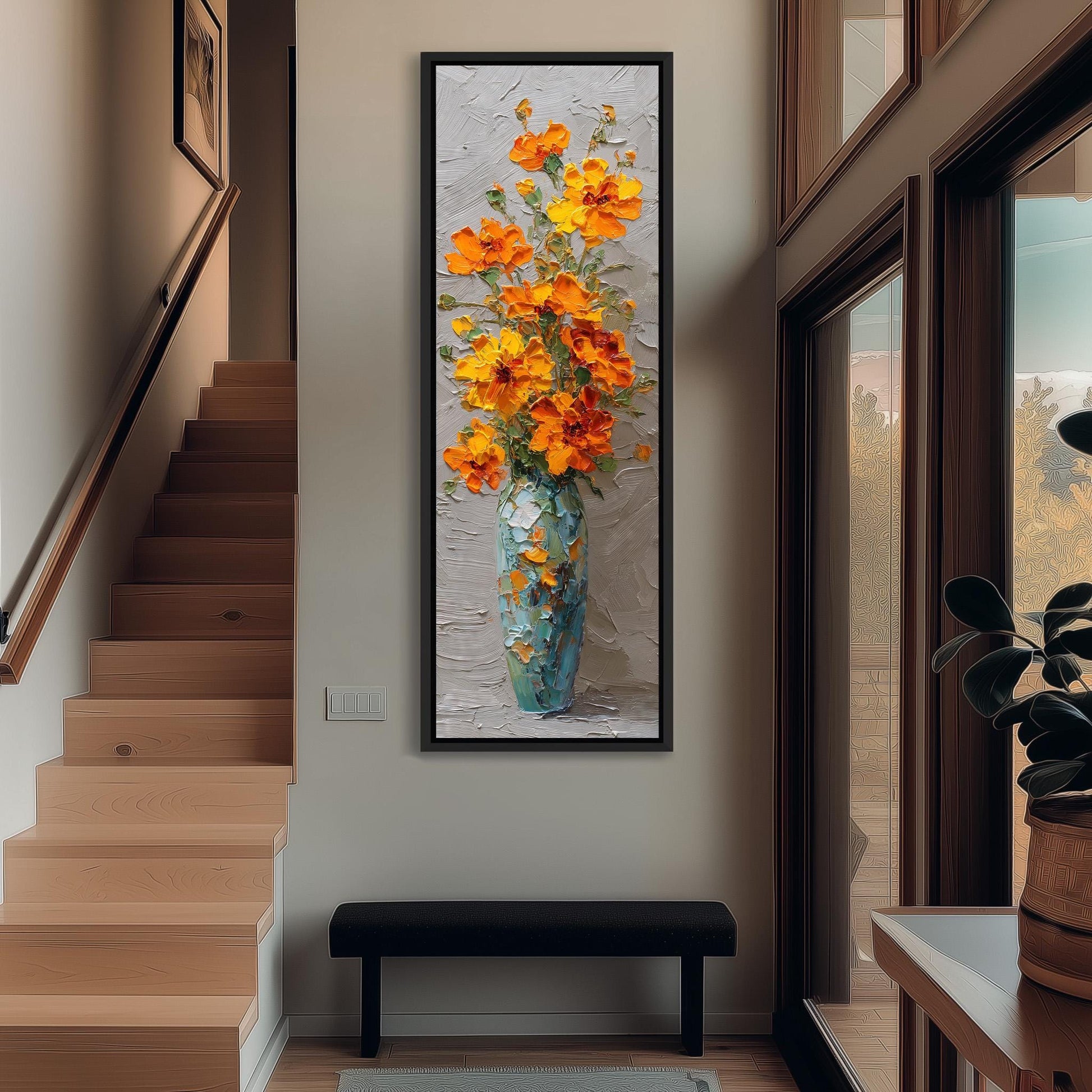 a large painting of a vase filled with orange flowers hanging on the wall of a hallway.