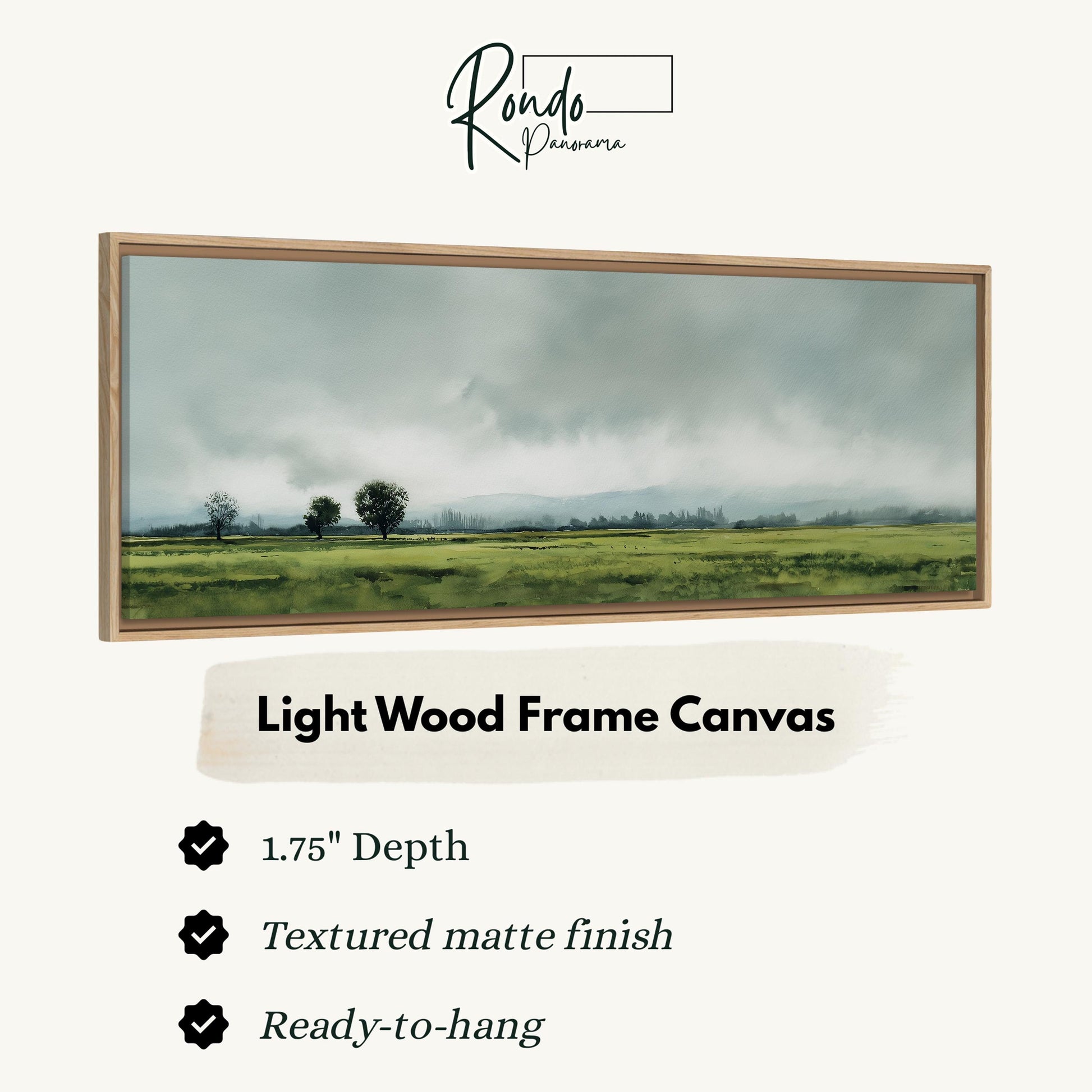 The image is a framed painting of a rural landscape with a field and trees, featuring a light wood frame.