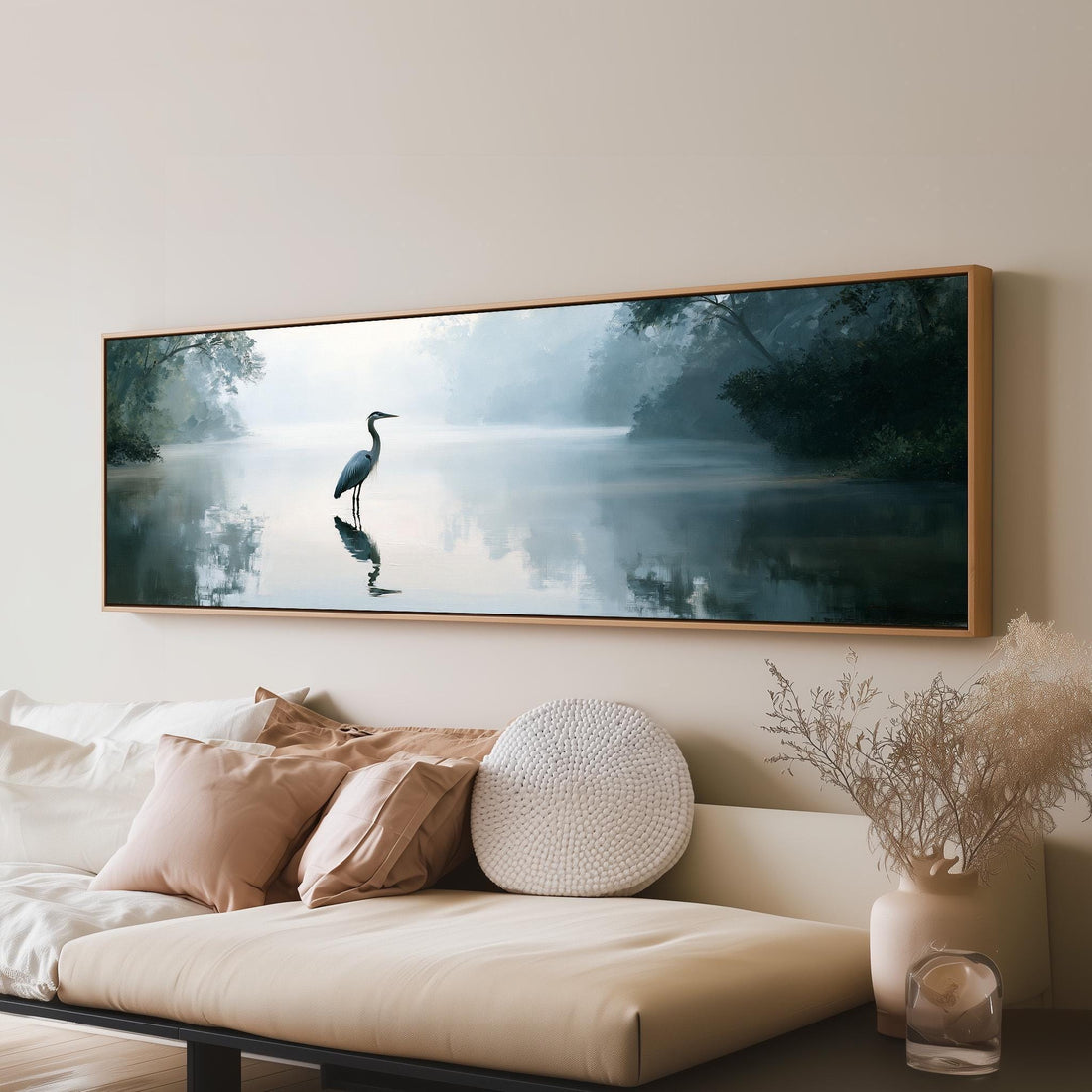 Heron standing in a misty wetland long horizontal canvas print above a sofa in a living room
