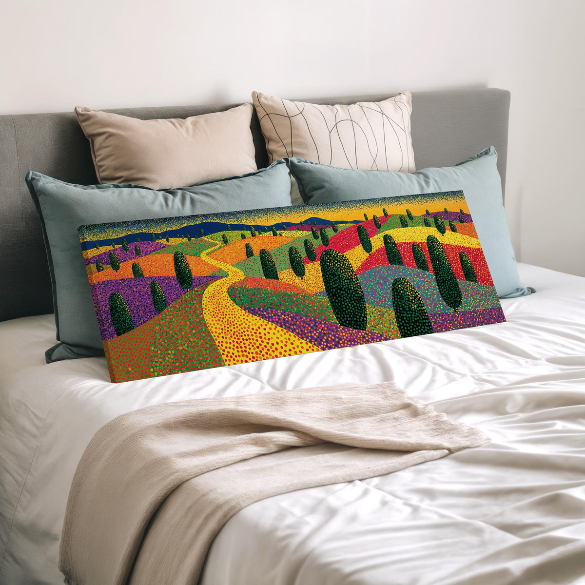 Colorful dotted garden with a winding path wide panoramic canvas print laid on a bed to show its size