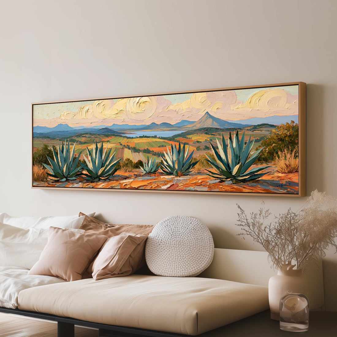 Agave plants above a desert valley long horizontal canvas print above a sofa in a living room