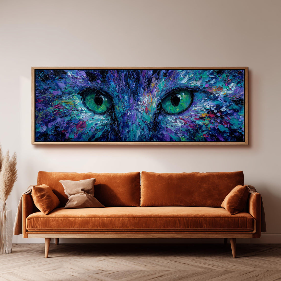 a large, colorful painting of a cat's eyes on a wall, with a black and white checkered sofa in the foreground.