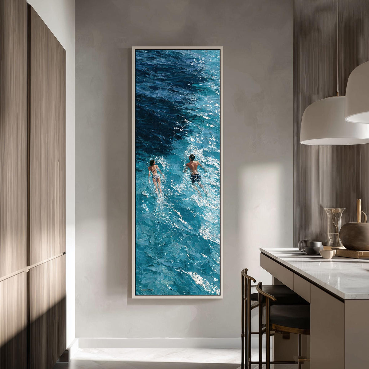Two swimmers in deep blue waves tall skinny canvas print in a modern kitchen