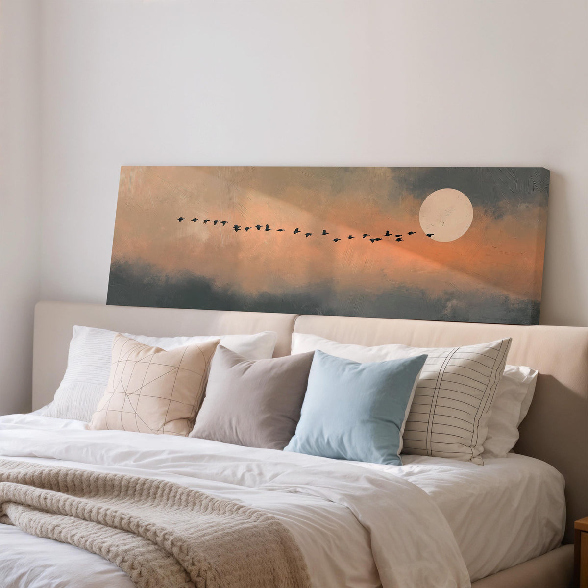Geese flying toward the moon at twilight wide panoramic canvas print above a bed in a bedroom