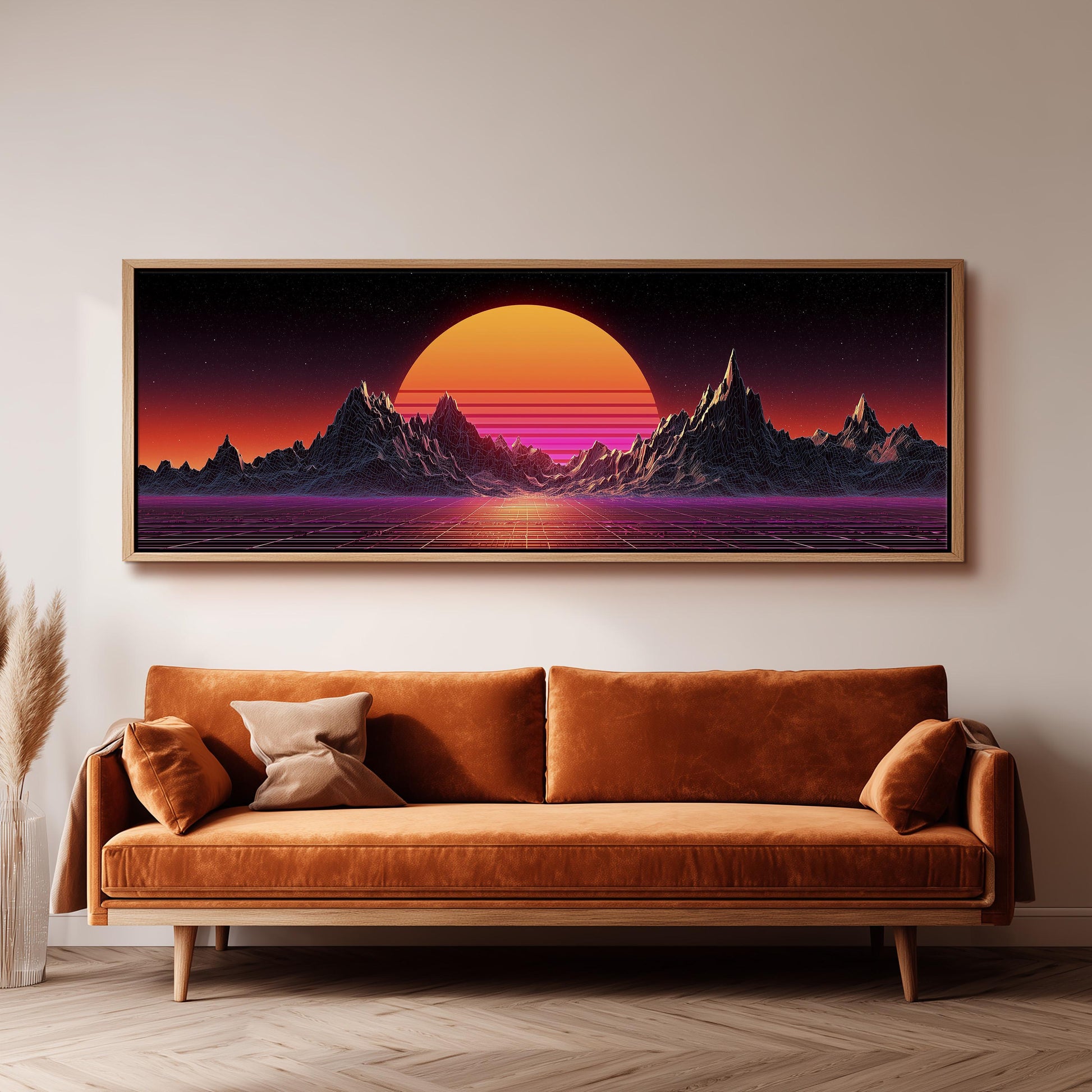 a large, framed painting of a sunset landscape hanging on a wall above a brown sofa.