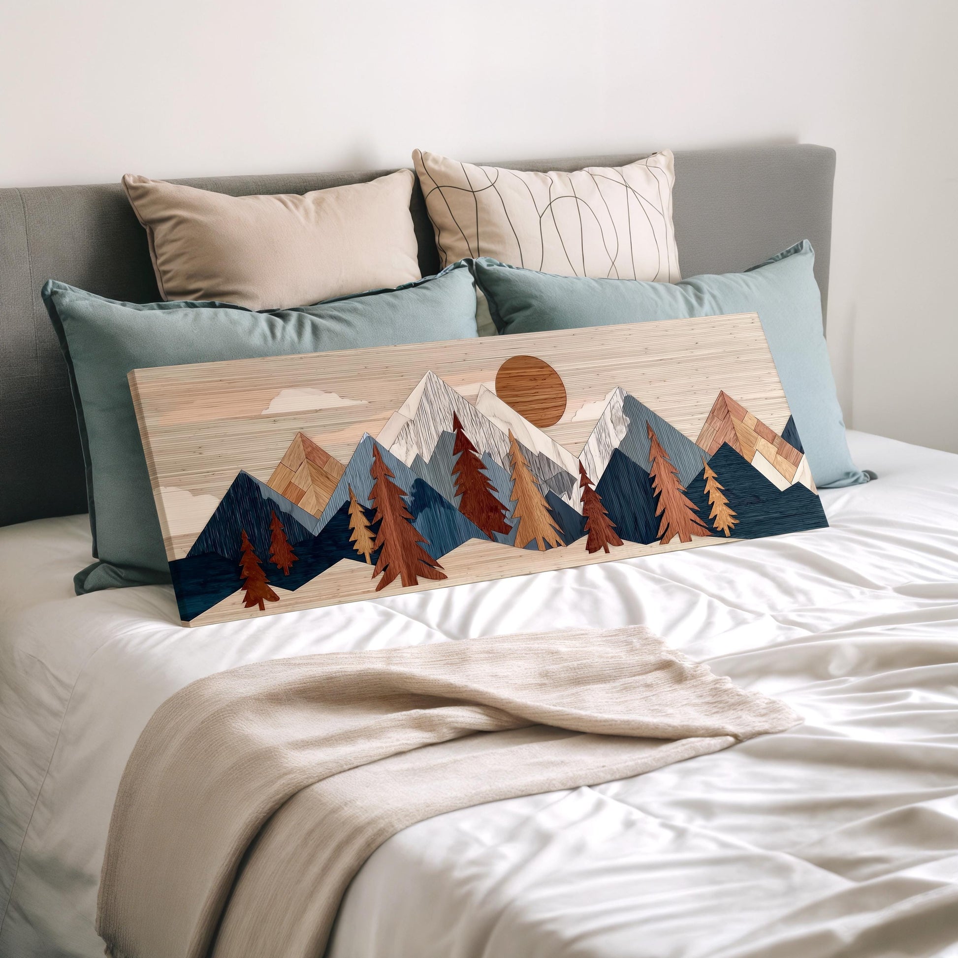 a bed with a wooden panel displaying a mountain landscape with trees and a sun in the sky.