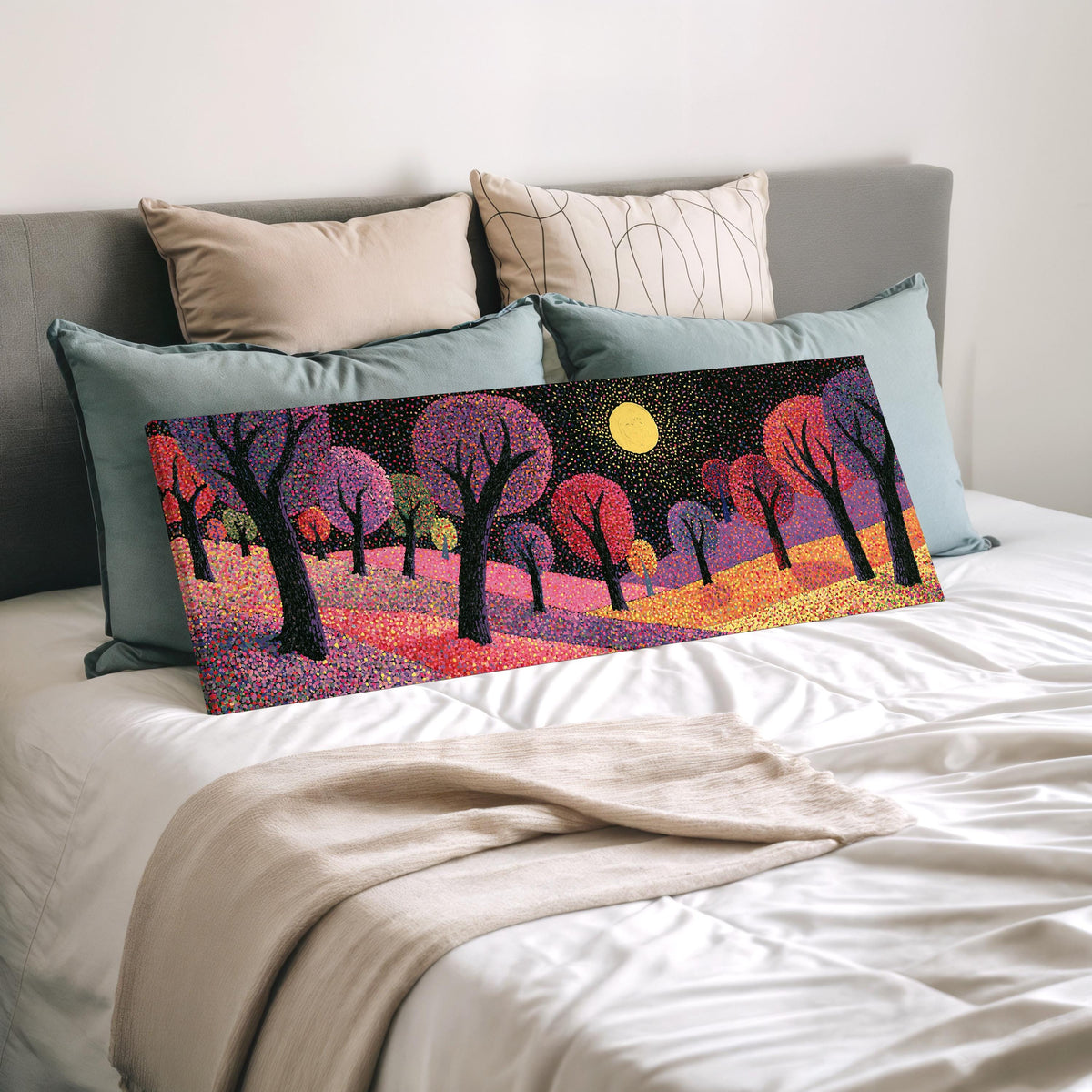 Purple dusk forest under the moon wide panoramic canvas print laid on a bed to show its size