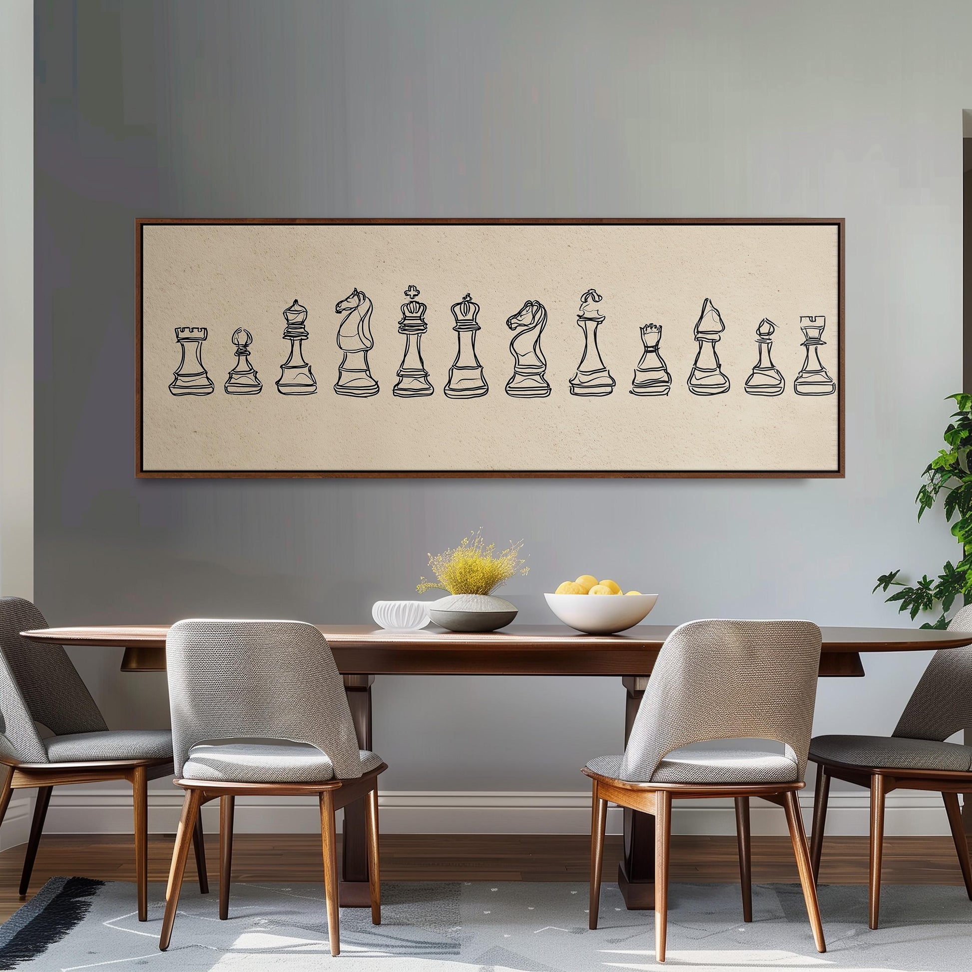 a dining room with a wooden table and four chairs. Above the table, there is a large framed artwork depicting a chessboard with various chess pieces.