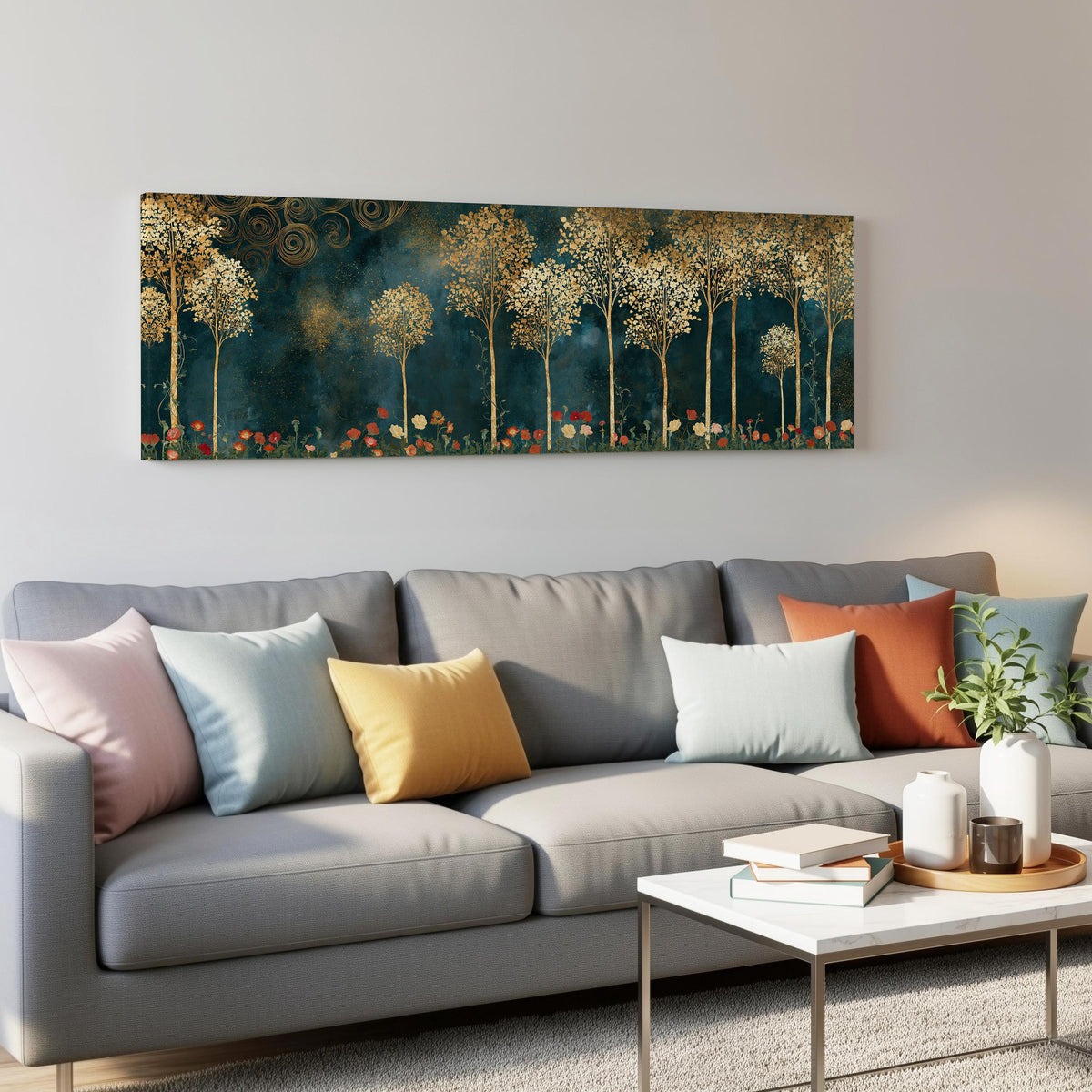 Gold leaf trees above red poppies on teal panoramic canvas print above a grey sofa in a living room