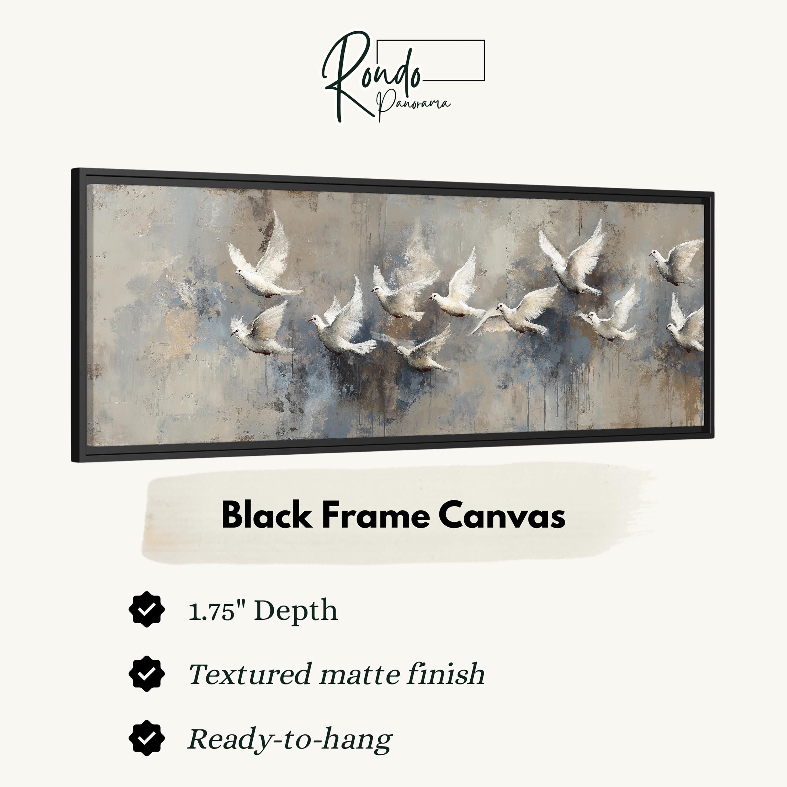 a black frame canvas with a painting of a flock of white birds in flight.