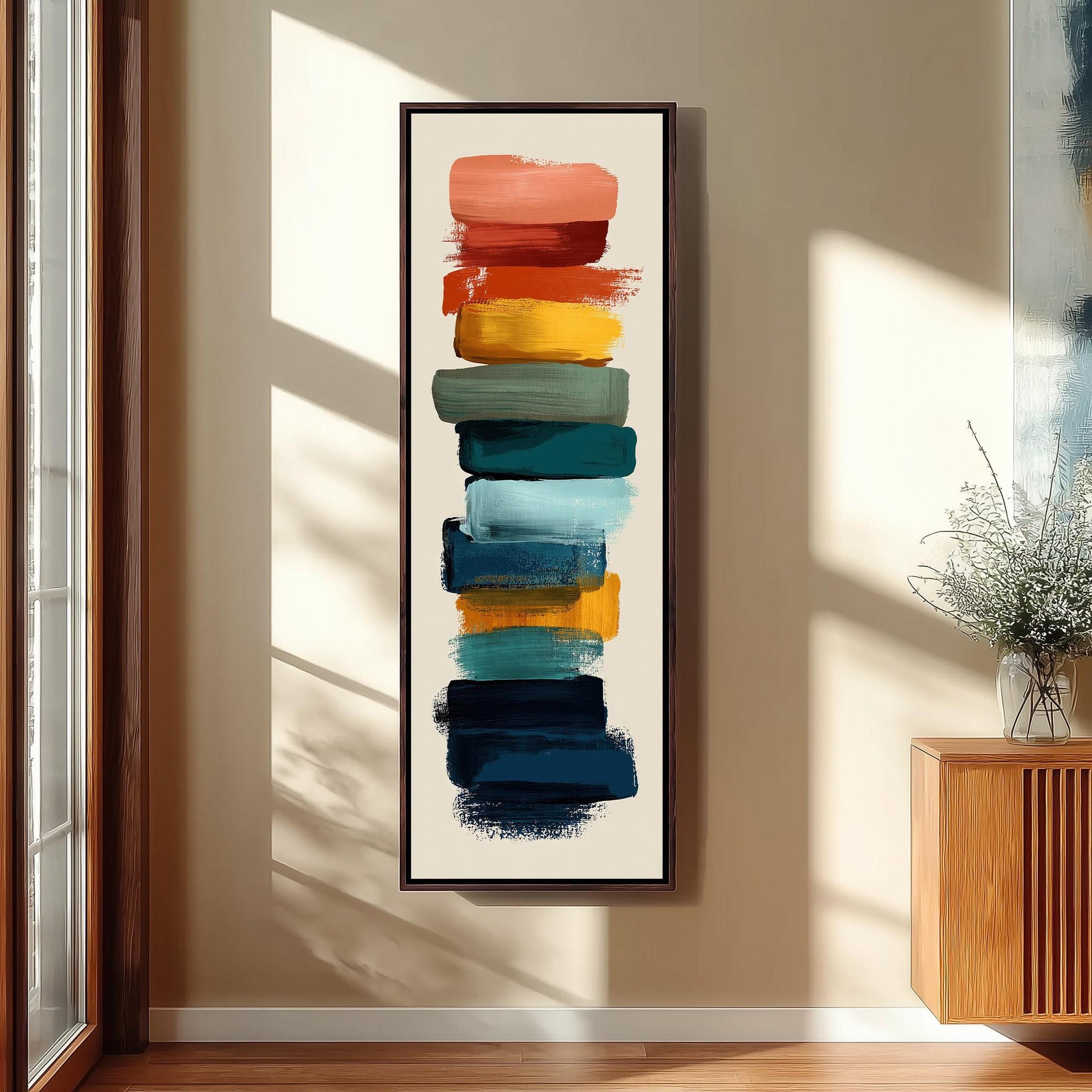 a vibrant abstract painting with bold brushstrokes in various colors, including red, orange, yellow, green, blue, and purple, arranged in a vertical line on a wall.