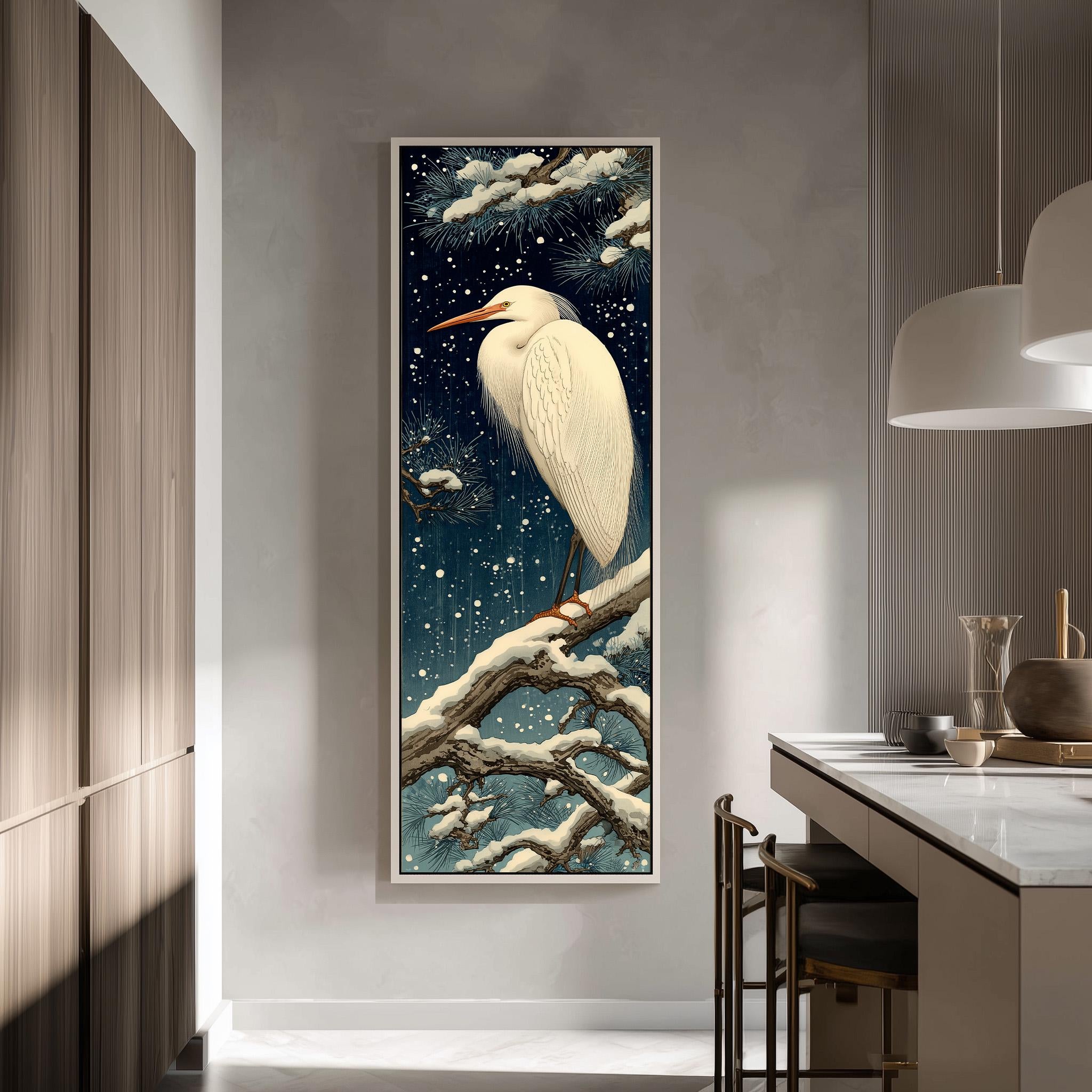 a large, framed painting of a white egret perched on a branch, with a snowy background and a starry night sky.