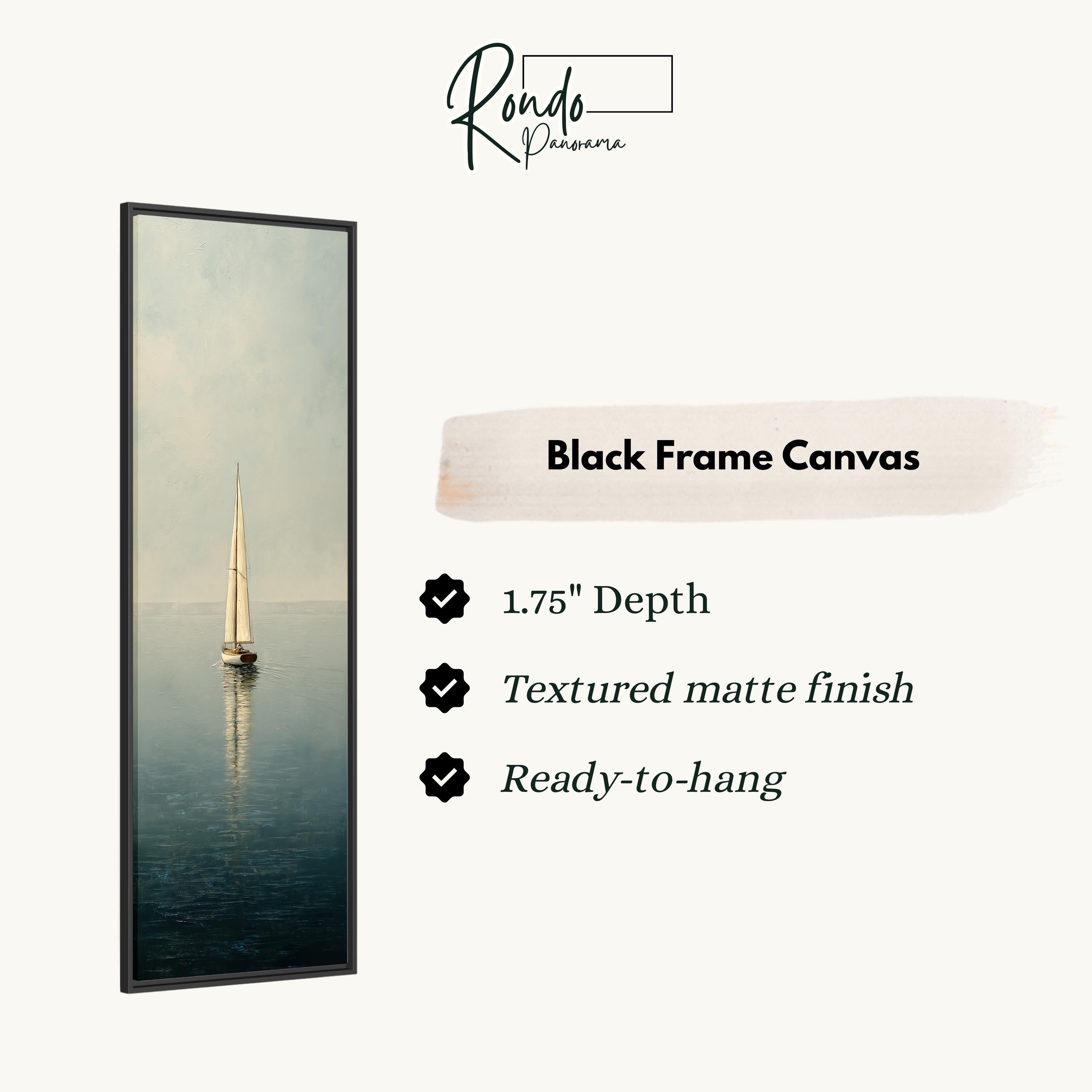 a black frame canvas depicting a sailboat on the water.