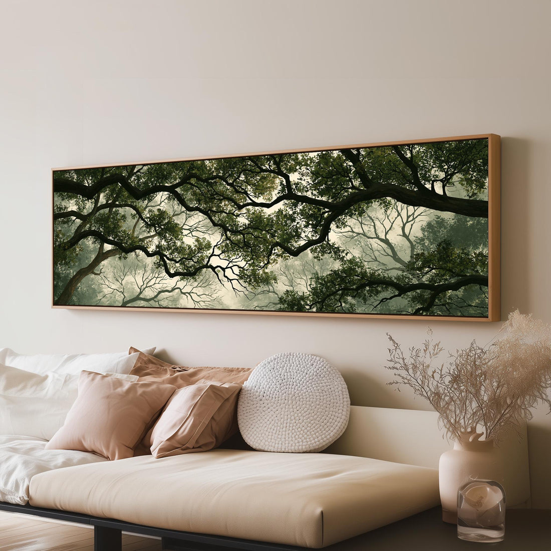Misty forest canopy long horizontal canvas print above a sofa in a living room